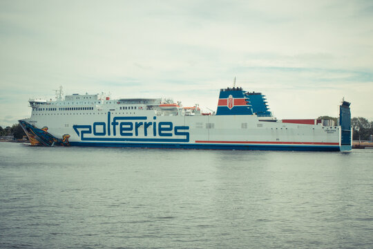 Swinoujscie, West Pomeranian - Poland - June 15, 2021: Cracovia ferry leaving port of Swinoujscie and sailing to Ystad. Transport passengers and cars
