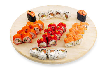 Assorted sushi rolls with salmon, avocado, tobiko, and strawberries arranged on a round wooden serving board isolated against a white background as Japanese cuisine © Кирилл Горшков