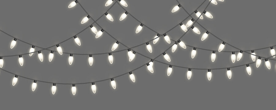 PNG. Realistic golden LED string lights on a transparent background. Soft warm bulbs create a festive glow. Ideal for winter invitations and digital designs.