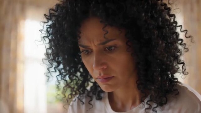 A young woman experiencing feminine pain hormonal imbalance restlessness and emotional distress