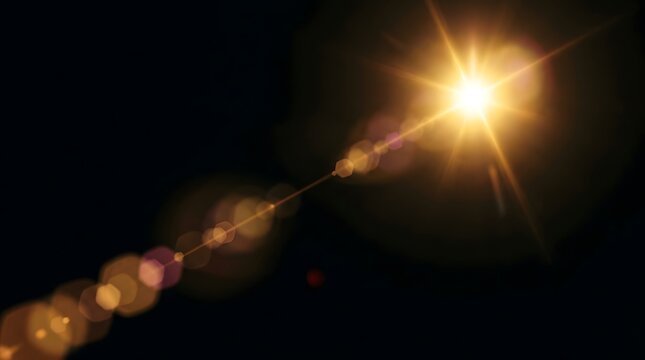 A dramatic golden light flare beautifully blends with soft blurred bokeh against a dark background to evoke a vibrant energetic feeling