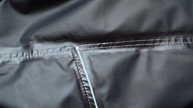 waterproof jacket fabric with taped seams. membrane material for clothing