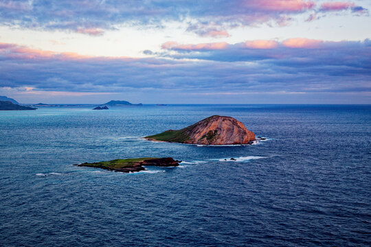 Rocky Offshore Islands Beneath Colorful Twilight Sky