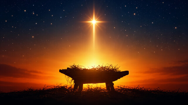 Empty manger under bright Christmas star at night