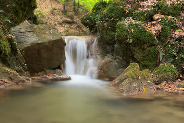 waterfall in the woods © Yasin