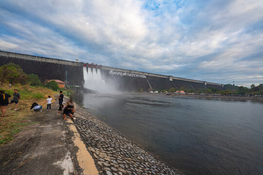 Nakornnayok Thailand,06 December 2025: Khun Dan Prakan Chon Dam released water on from via the Spillway. The scene highlights the scale of the dam and its surrounding landscape.