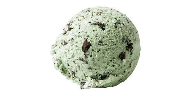 Isolated scoop of refreshing mint chocolate chip ice cream with visible delicious chocolate pieces