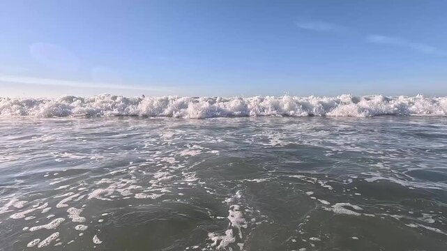 Arrietara beach waves crashing on shore Sopelana cliffs Basque Country Spain coastal ocean video clip footage.