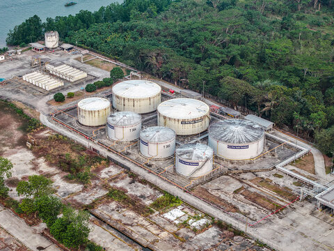Aerial view of Pro Tank Terminal - International Fuel Storage featuring industrial fuel tanks and concrete storage areas in Samarinda, East Kalimantan, Indonesia.