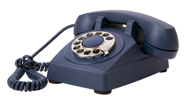 Isolated vintage rotary dial telephone with classic design and coiled cord, old communication device