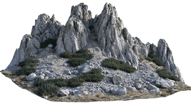 Isolated jagged rock formation with craggy peaks, sparse green shrubs and dry desert grass.