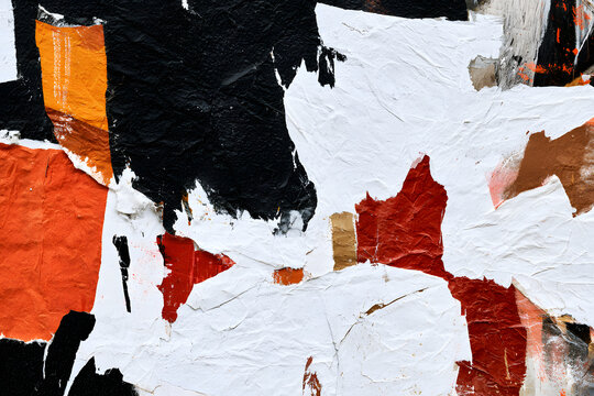Black, white, orange, red, and brown crumbled paper fragments create a patch collage artwork. It's perfect for a wall, featuring an abstract grunge look with a dirty texture and contrasting background