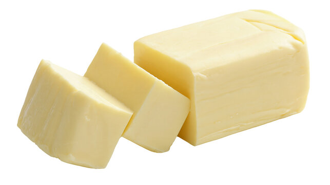 Isolated yellow block of fresh dairy butter cut into three slices, ingredient for cooking