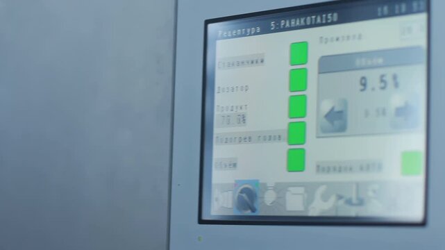 Touchscreen control panel dairy machine. Camera pan closeup automation display.