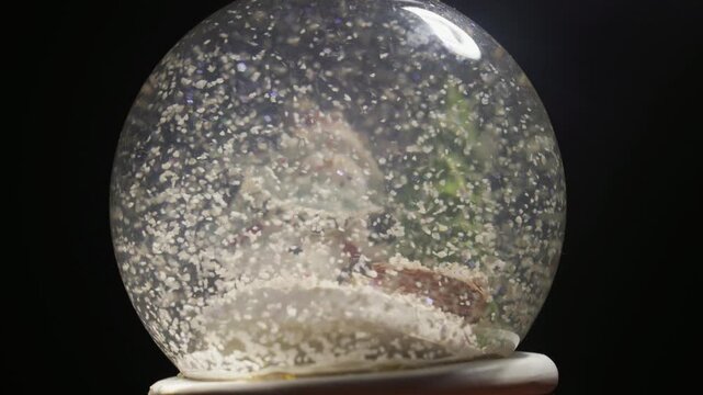 Vertical Christmas Snow Globe Macro Shot with Falling Snow Video