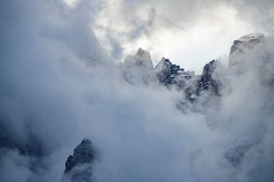 Snowy, cloudy ridge of the Civetta Group, Zoldo Alto, Val di Zoldo, Dolomites, Italy