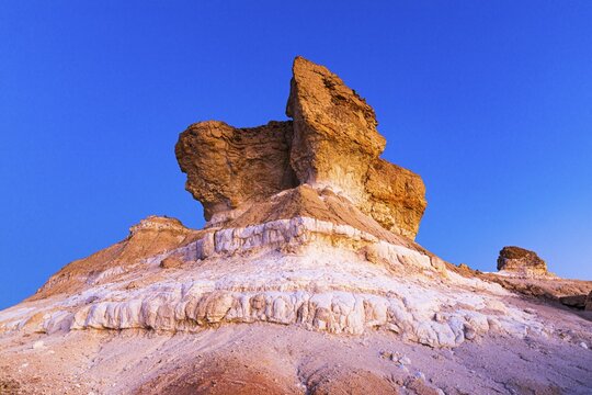Striking rock formation in the Huqf stone desert in the morning light, Arabian Peninsula, Sultanate of Oman