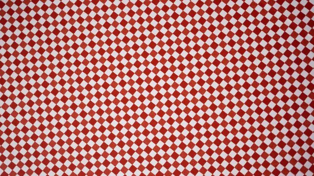 Continuous Panning Red and White Checkerboard Pattern Background Video