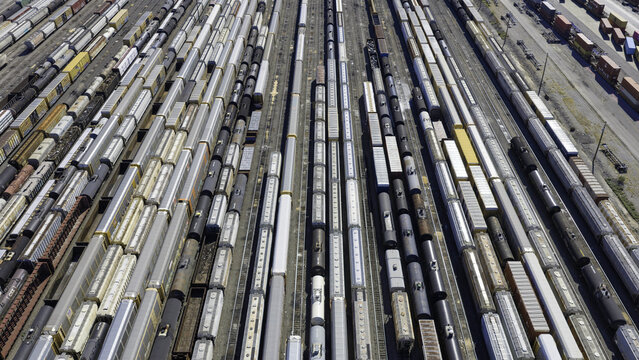 Aerial view of CSX's Radnor Yard and Nashville Intermodal train terminal featuring numerous freight train cars lined up on parallel tracks in Nashville, TN, United States.