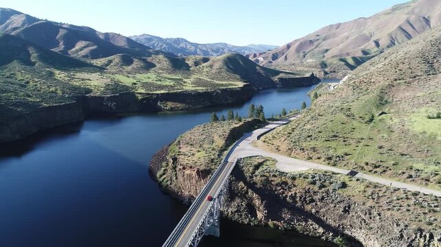Road curves along scenic waterway