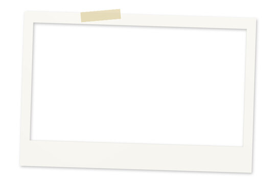 Tilted white instant photo frame with beige adhesive tape a blank caption strip and transparent picture opening PNG
