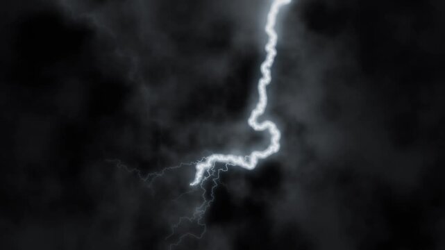 Lightning bolt flashes and fades through dark storm clouds during a thunderstorm