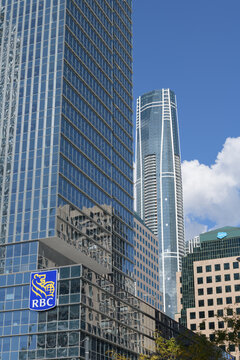 corporate logo outside RBC WaterPark Place with view of SkyTower by Pinnacle International at 1 Yonge St, Toronto