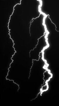 White lightning branches flicker and reshape against a stark black background