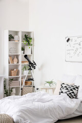Stem education and scientific curiosity, telescope in a bedroom with chemistry formulas on a whiteboard for home learning and academic research © Pixel-Shot