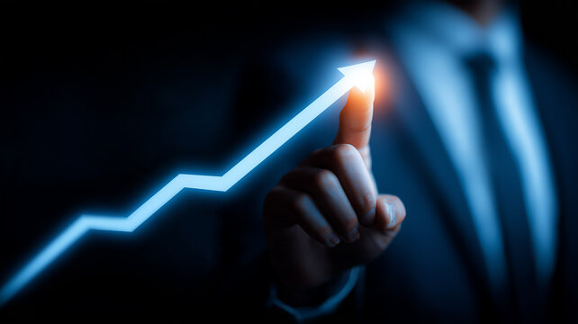 A business professional touching a rising arrow illustrates financial growth and strategic business success.