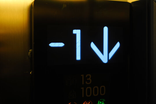 Elevator display showing level minus one with downward arrow