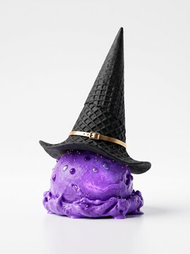Melting purple ice cream scoop wearing black waffle cone witch hat with golden buckle on white background, Halloween