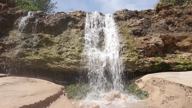 A waterfall situated right by the shore at Pacar Beach in Tulungagung, East Java.