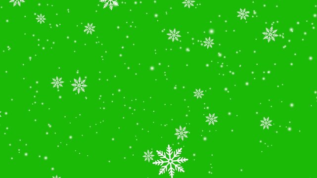 Realistic snow flakes randomly falling overlay on green screen background. Heavy snowfall delicate Christmas festive backdrop. Beautiful Snowflakes bokeh flying for new year holiday decoration.