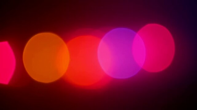 Colorful Bokeh Lights Glowing With Warm And Vibrant Blurred Circles Creating Abstract Dark Background