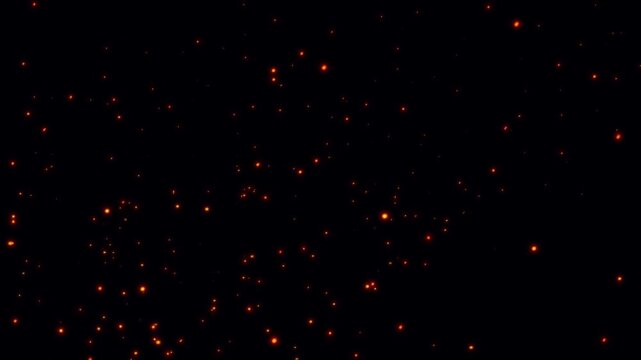 Realistic fire sparks burning flying in wind. Fiery orange hot ember particles floating night air. Cinematic fire particles energetic over black background. Flames and ashes are engulfing the sky.