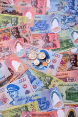 Brunei paper money, dollar banknotes and sen coins as currency for exchange or travel. Brunei money © chernikovatv