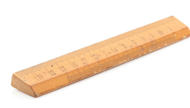 Wooden ruler with measurement markings in centimeters and inches.