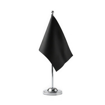 Small black table flag on a shiny metal pole stand for office desk decoration or corporate presentation isolated on transparent background