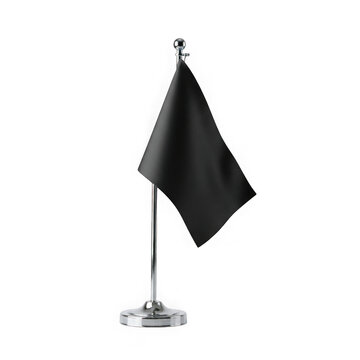 Small black flag on a silver desk pole stand representing a symbol of mourning or protest for an office desk isolated on transparent background