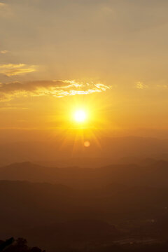 Vertical Dramatic sunset golden red sky scenic landscape sunrise dawn heaven. Vertical Horizon Golden sky sunrise dramatic beautiful landscape view. Dawn sky gold dusk time cloudscape with sunlight