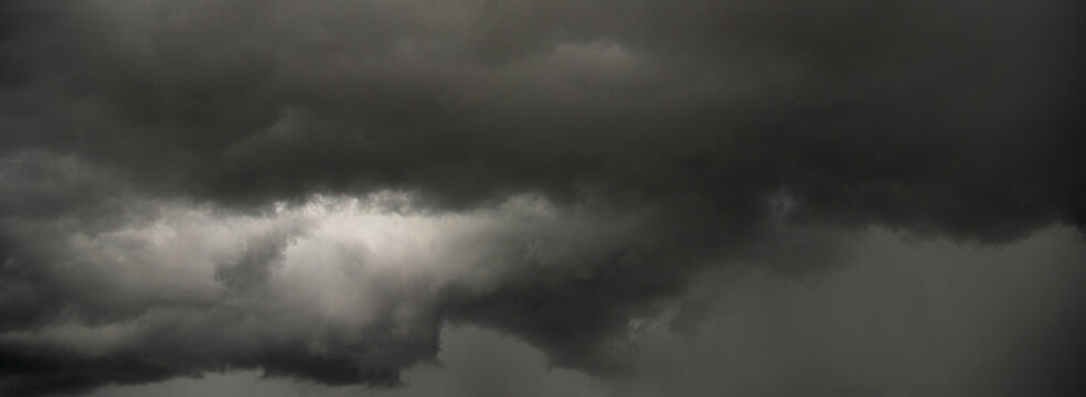 Banner Dark cloudscape storm disaster gloomy gray cloud sky. Dark thunderstorm clouds rainny atmosphere. Dark cloudscape storm cloud with copy space. Meteorology danger windstorm disasters