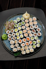 Assorted sushi maki rolls on a large sharing platter © Cavan