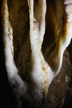 Detailed macro shot of a wet cave flowstone formation