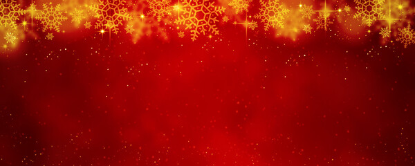 A Christmas background with bokeh and snowflakes in gold and red tonestones. © Anna