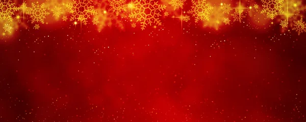 A Christmas background with bokeh and snowflakes in gold and red tonestones. © Anna