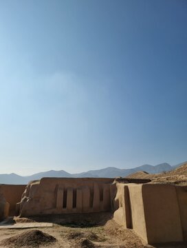 Archaeological Ruins of Ancient Parthian Nisa Fortress with Mountains Background