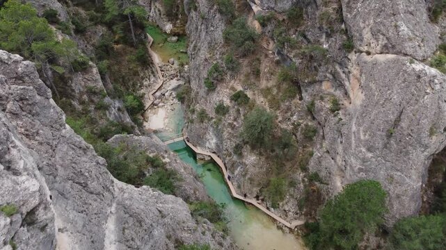 Aerial View of Hikers Exploring the Fluvial Route in Teruel Spain