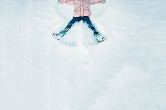 High angle view of a person making a snow angel