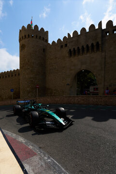 BAKU, AZERBAIJAN - SEPTEMBER 2026: Aston Martin F1 Team race car navigates the narrow Old City castle section during the Azerbaijan Grand Prix